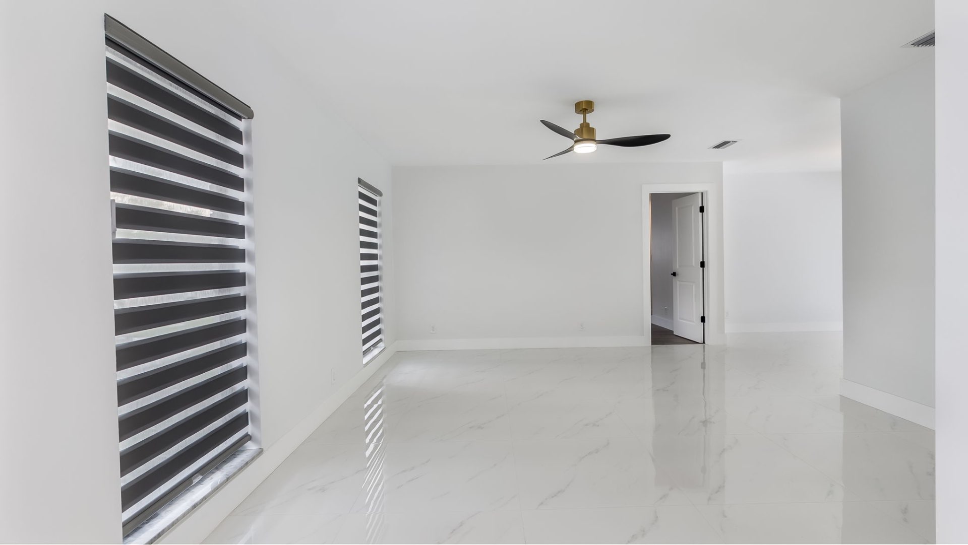 Spacious living room with modern blinds