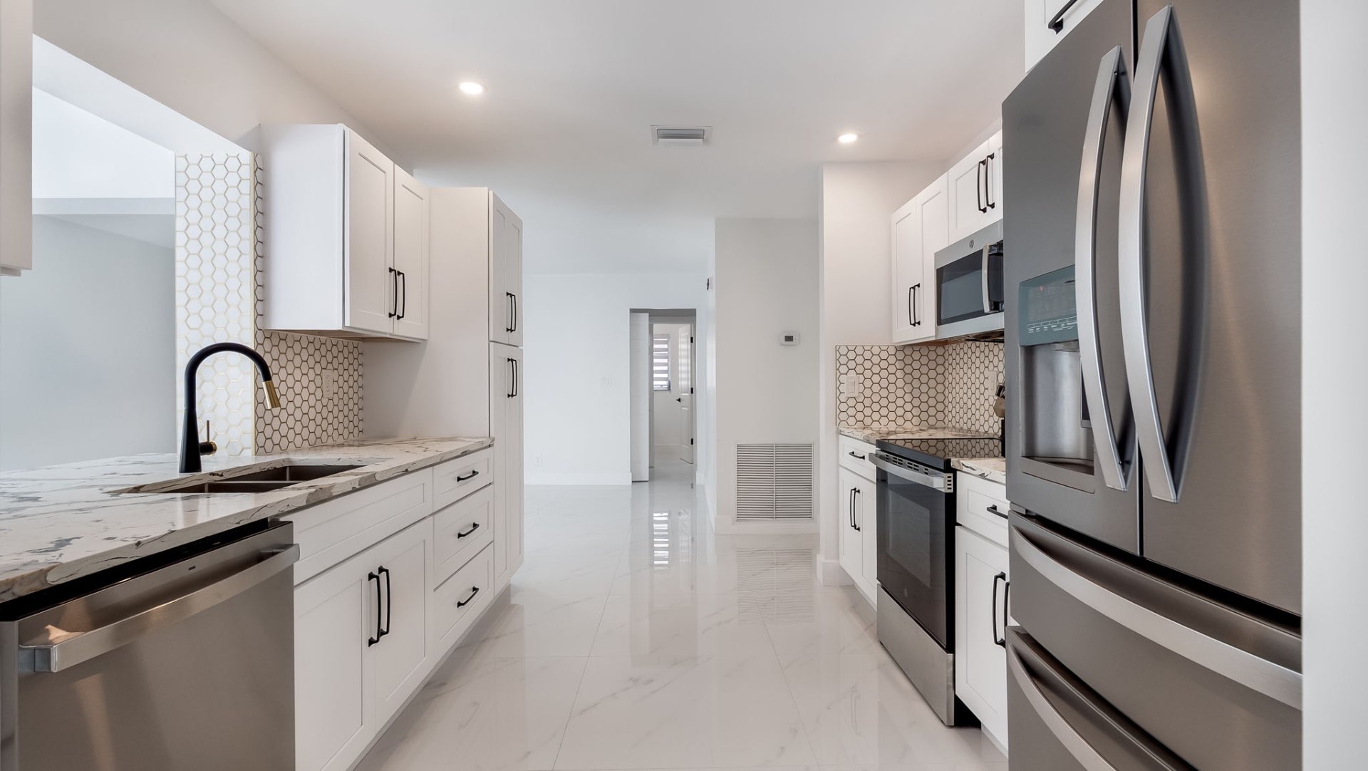 Modern kitchen with stainless steel appliances