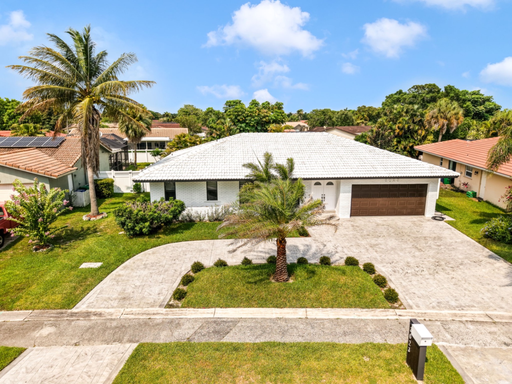 Front exterior of 3023 NW 123 Ave in Coral Springs, Florida at golden hour